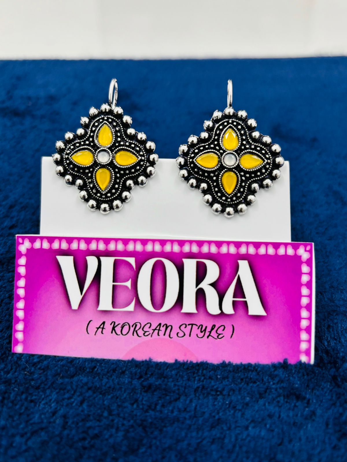Luxery Best stud with yellow colour Earrings set Of 1